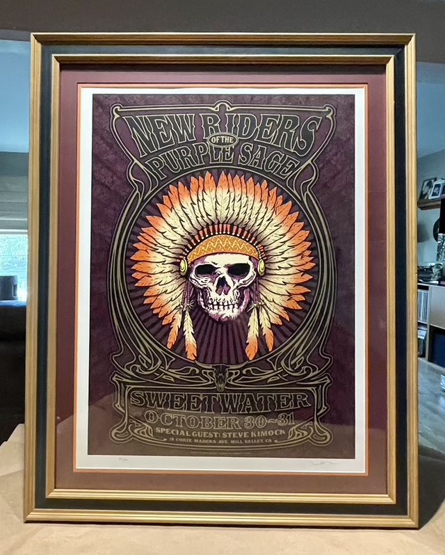 A New Riders of the Purple Sage concert poster framed by Ford Framing in a gold frame with dark purple and white mats